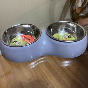 Brand Bew Set Of Elevated Bowls Steinless steel.